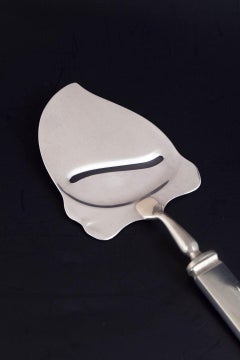 Evald Nielsen. Art Deco cheese slicer in silver and stainless steel, 1930s