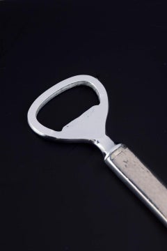 Evald Nielsen, bottle opener in silver and stainless steel. 1920s