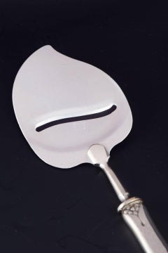 Evald Nielsen. Cheese slicer in silver and stainless steel, 1920s