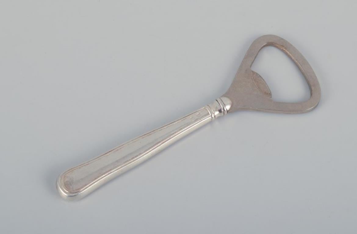 Mid-20th Century Evald Nielsen, Cohr, and other Danish silversmiths. Five bottle openers. For Sale