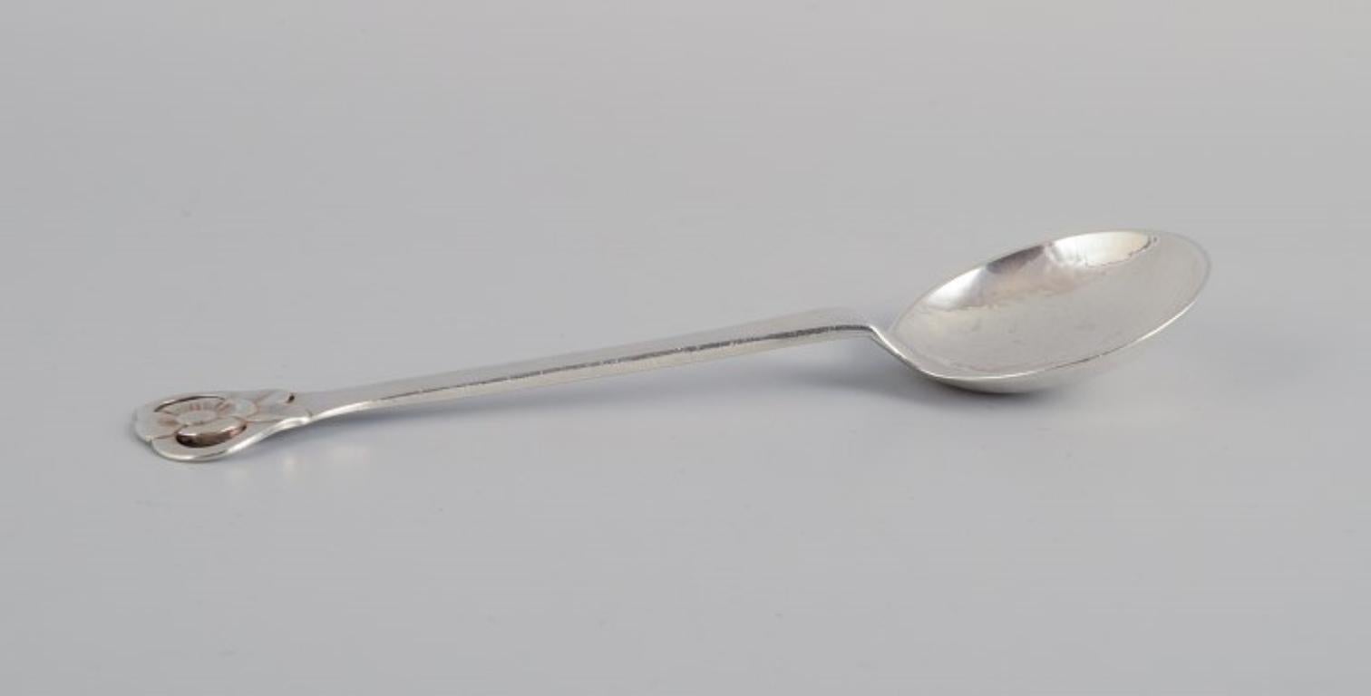 Evald Nielsen, Danish silversmith, two beautiful large Art Nouveau sugar spoons in Danish 830 silver.
One dated 1913.
Marked.
In excellent condition.
Longest spoon: L 16.2 cm.