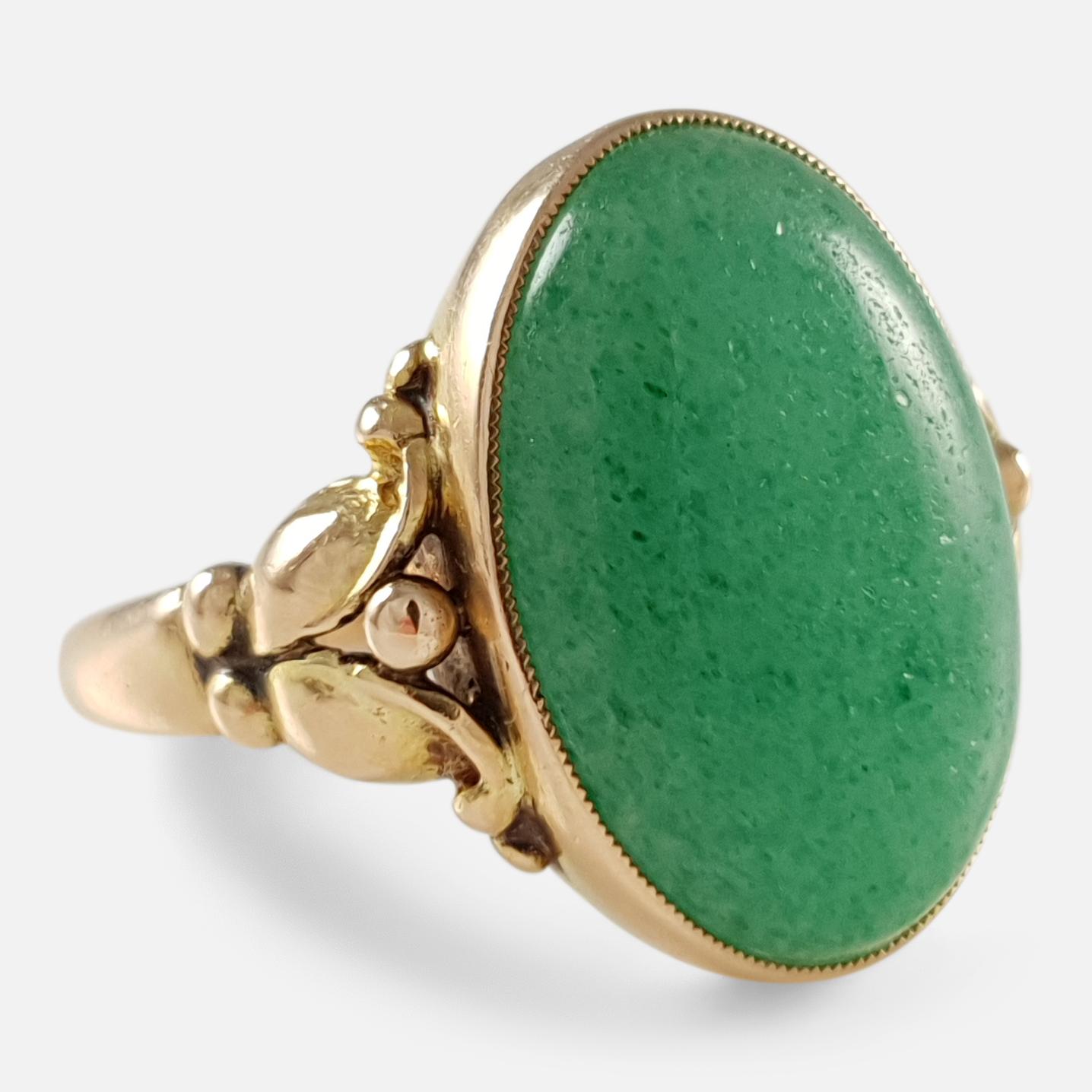 Description: - This is a superb early 20th century Danish Skønvirke 18 karat yellow gold and aventurine cabochon cut ring by Evald Nielsen. The aventurine is a lovely shimmering and glistening colour of green. The ring is stamped with the makers