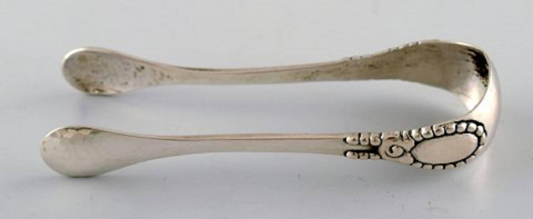 Evald Nielsen number 13, sugar tongs.
Measures 12 cm.
Stamped, 1920s, Denmark.
In perfect condition.