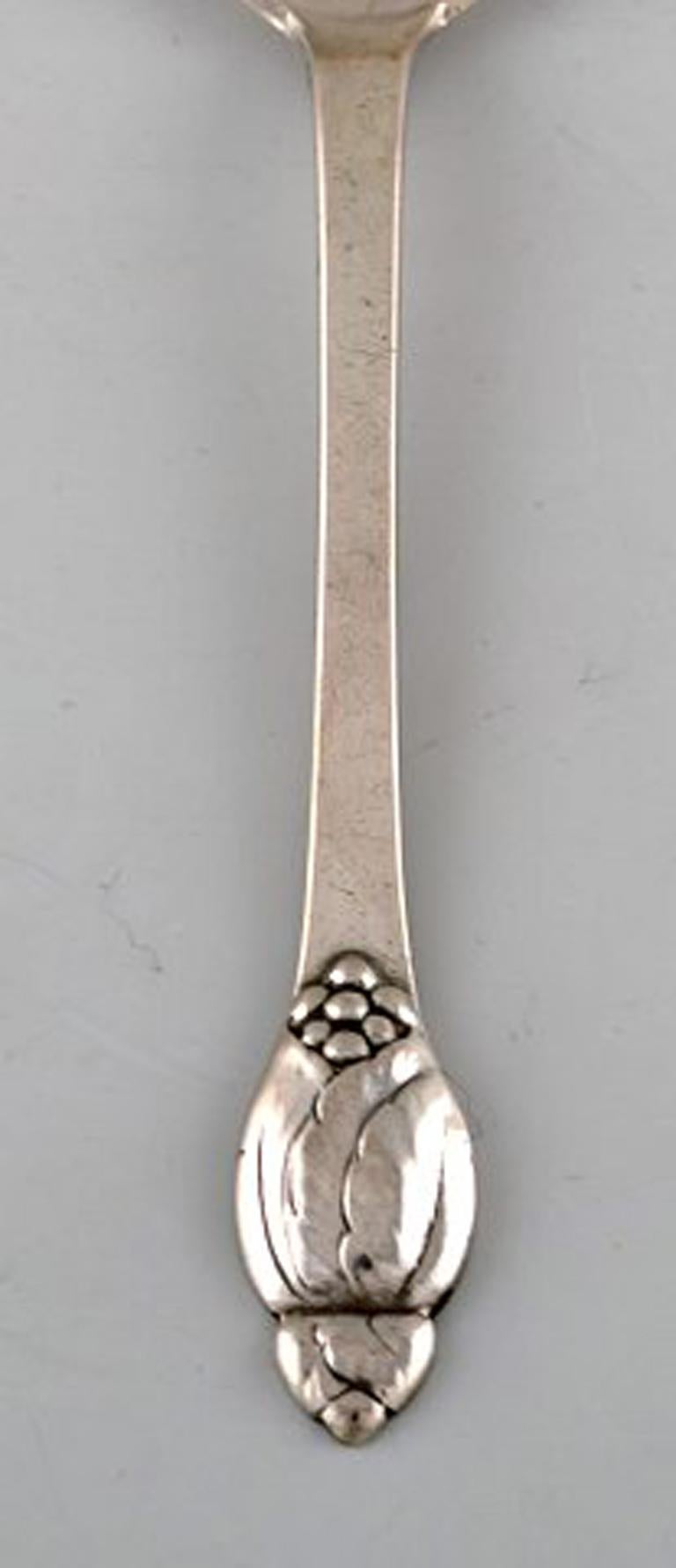 Evald Nielsen number 6, coffee spoon in all silver. 1920's. Ten pieces in stock.
Measures: 11,5 cm.
Stamped.
In perfect condition