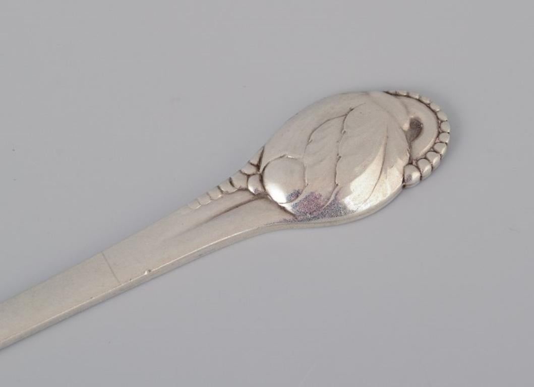 Evald Nielsen, rare Art Nouveau lobster fork in silver.
Model number 10.
Approx. 1920.
Marked.
In excellent condition.
Dimensions: L 17.3 x D 2.0 cm.

