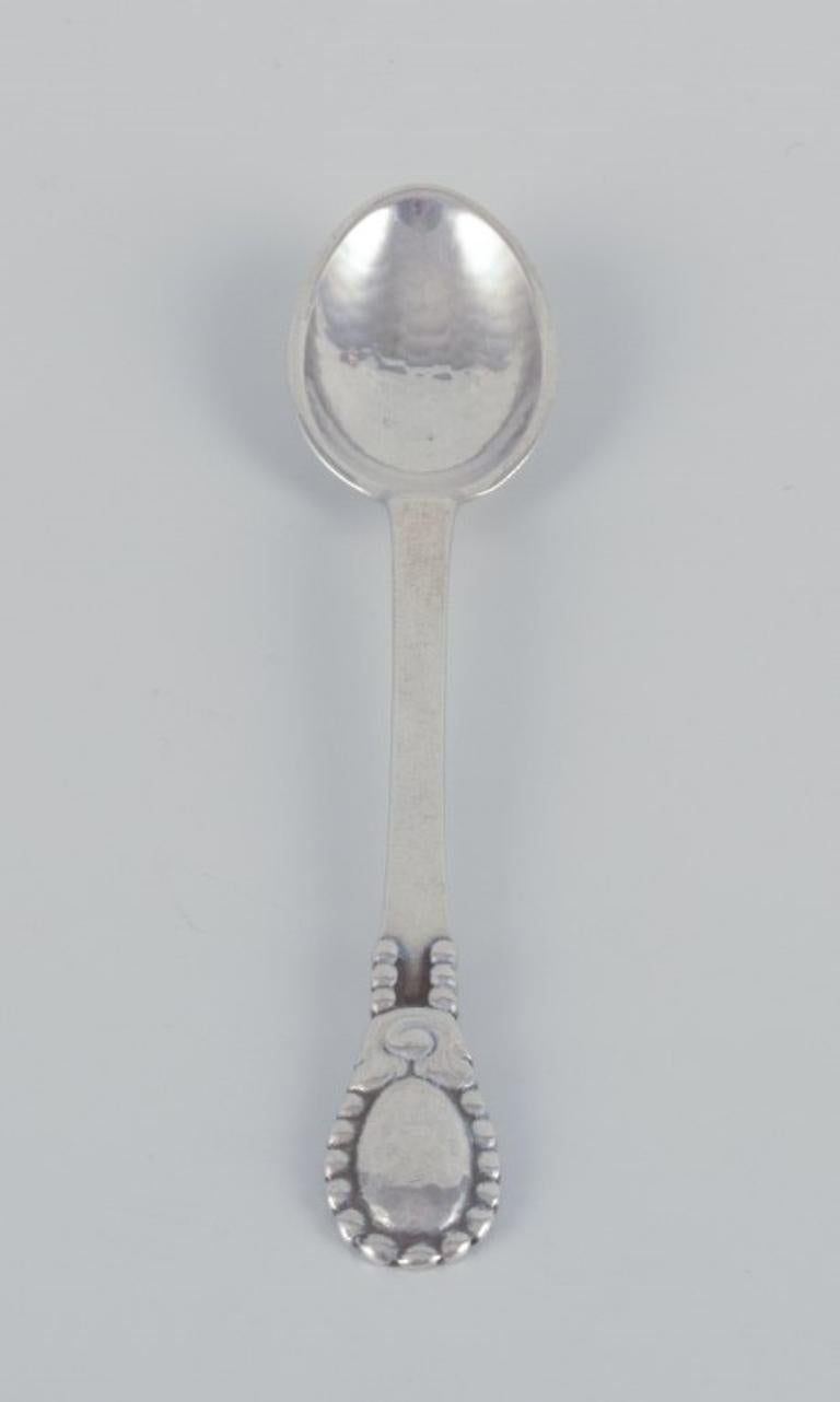 Danish Evald Nielsen, set of eleven coffee spoons in 830 silver.  For Sale