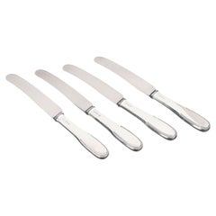 Evald Nielsen. Set of four dinner knives in silver and stainless steel, 1930s