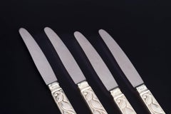 Evald Nielsen. Set of four fruit knives in sterling silver and stainless steel.