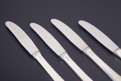 Evald Nielsen. Vierer-Set Essmesser aus Sterlingsilber und Edelstahl.