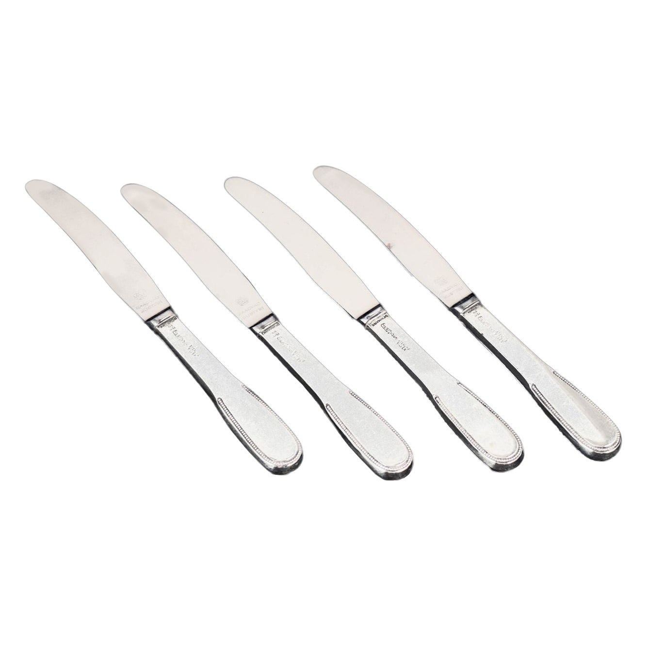 Evald Nielsen. Set of four lunch knives in sterling silver and stainless steel