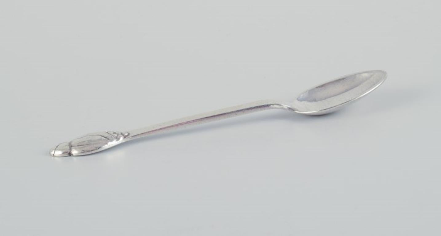 Evald Nielsen No 6, a set of twelve coffee spoons in 830 silver.
Hammered finish.
From the 1920s.
Hallmarked.
In perfect condition.
Dimensions: Length 11.3 cm.