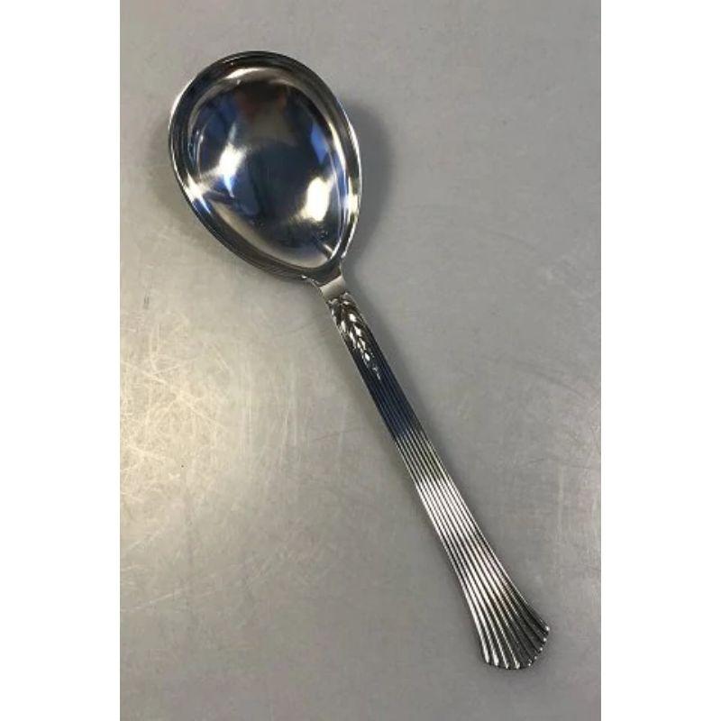 Evald Nielsen sterling silver serving spoon.

Measure: L 22 cm(8.66 in).