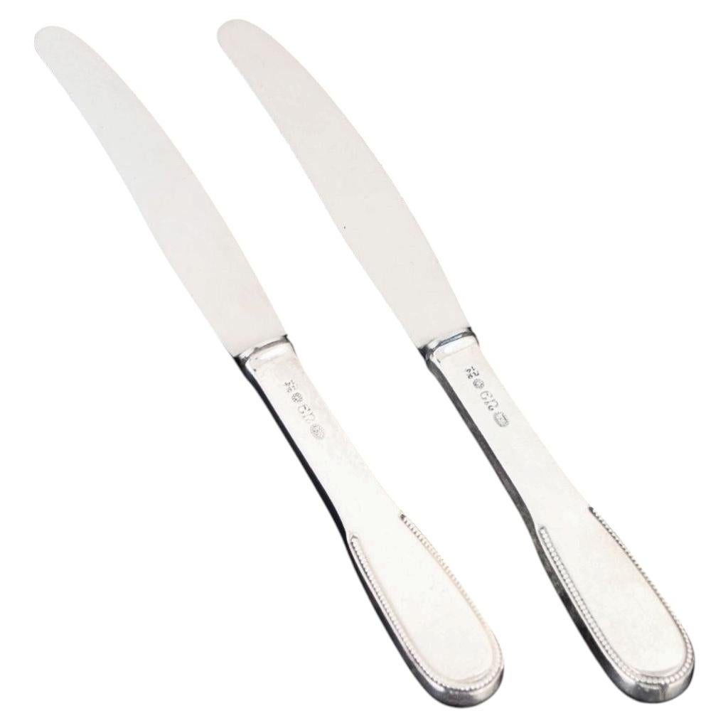 Evald Nielsen, two lunch knives in silver and stainless steel. 1930s For Sale