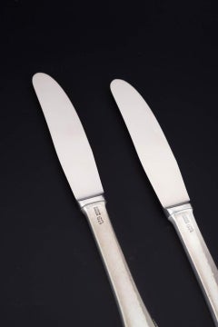 Evald Nielsen. Two lunch knives in sterling silver and stainless steel. 1930s