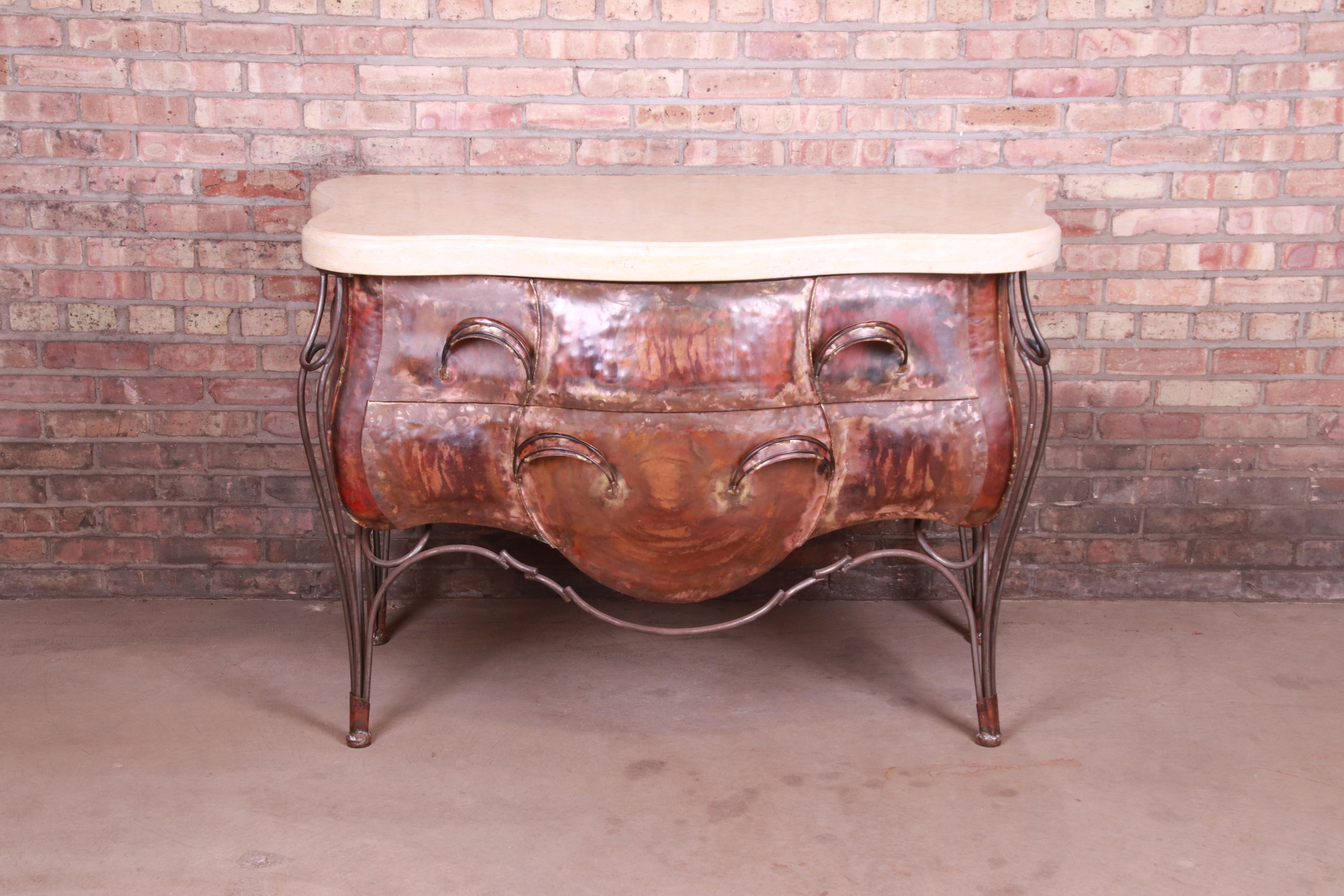 A gorgeous modern French Louis XV style bombay chest or commode

By Evan Lewis Inc.

USA, Circa 1990s

Patinated copper body with patinated steel inset and thick marble top.

Measures: 53