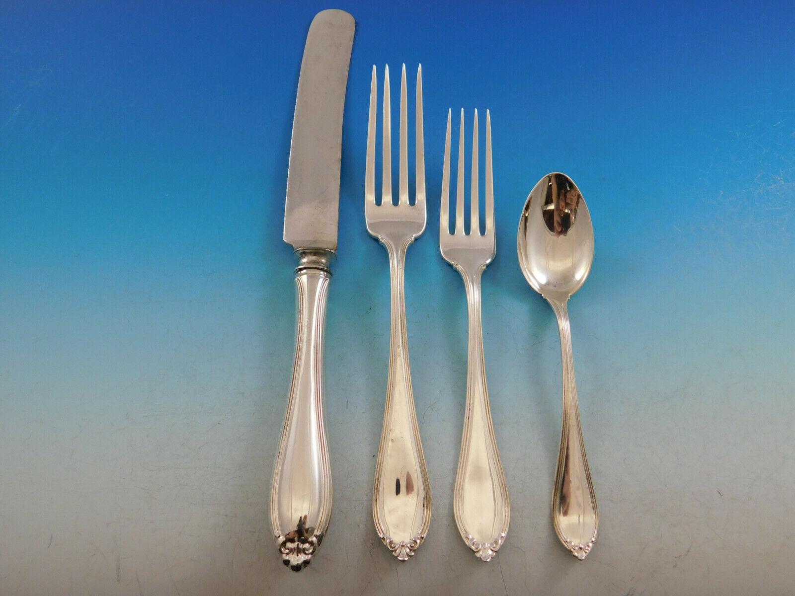 Monumental dinner and luncheon size set in the scarce 1907 pattern Evangeline by Alvin, 102 pieces. This set includes:

12 dinner knives, 9 3/4