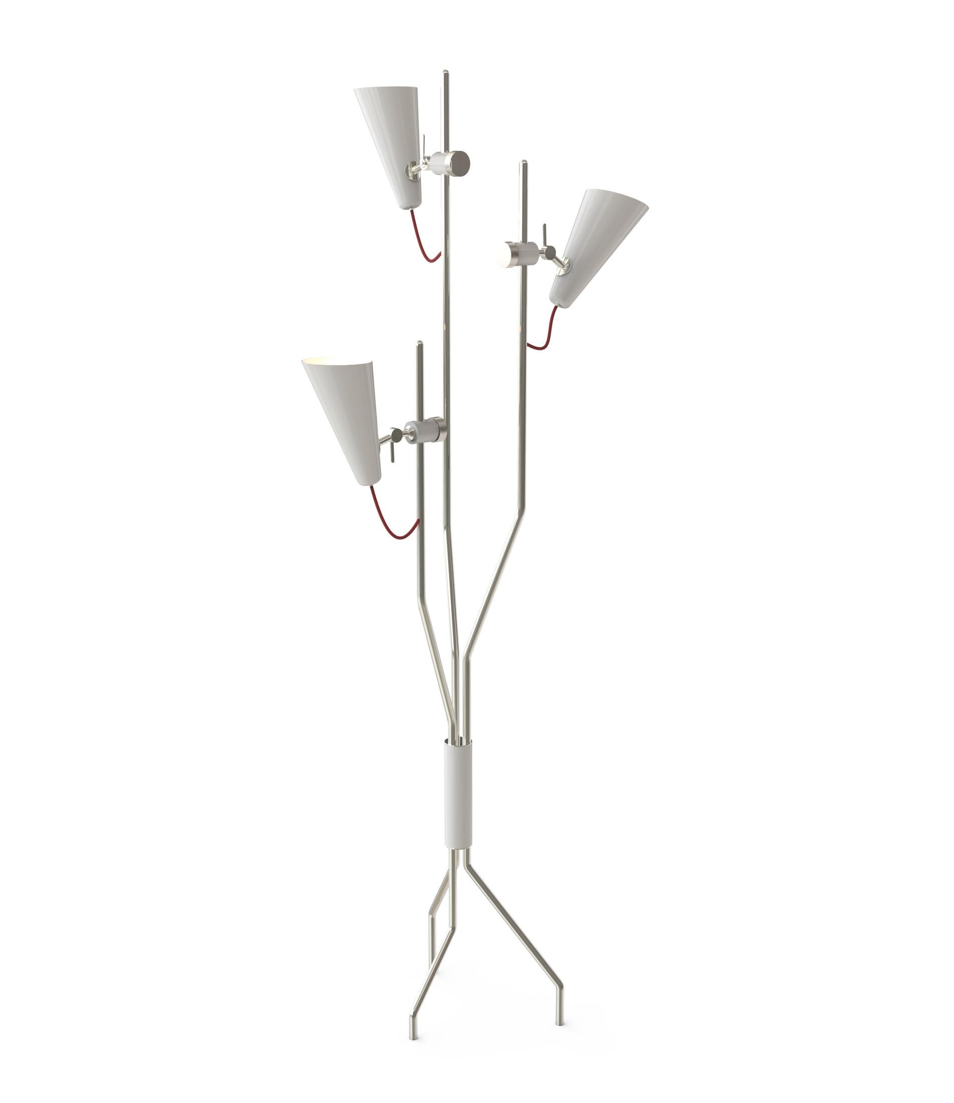 With a mid-century modern vibe, this Evans floor lamp has three diffusers. Each shade is moveable and adjusts making this a very functional light source that can be changed depending on where it is placed. This tripod floor lamp features an