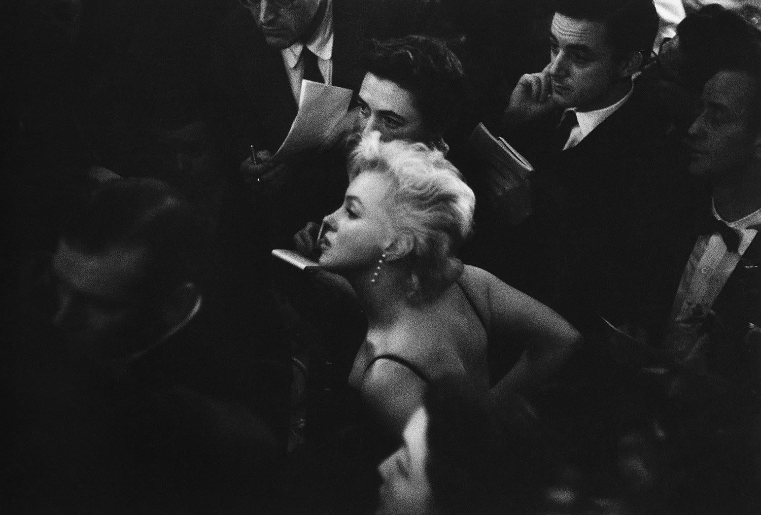 Marilyn Monroe in the Waldorf Astoria Ballroom in New York City, 1956.

All available sizes and editions:
20" x 24", Edition of 25 + 3 Artist Proofs
24" x 34", Edition of 25 + 3 Artist Proofs

"Eve Arnold, born in 1912 to Russian-immigrant parents