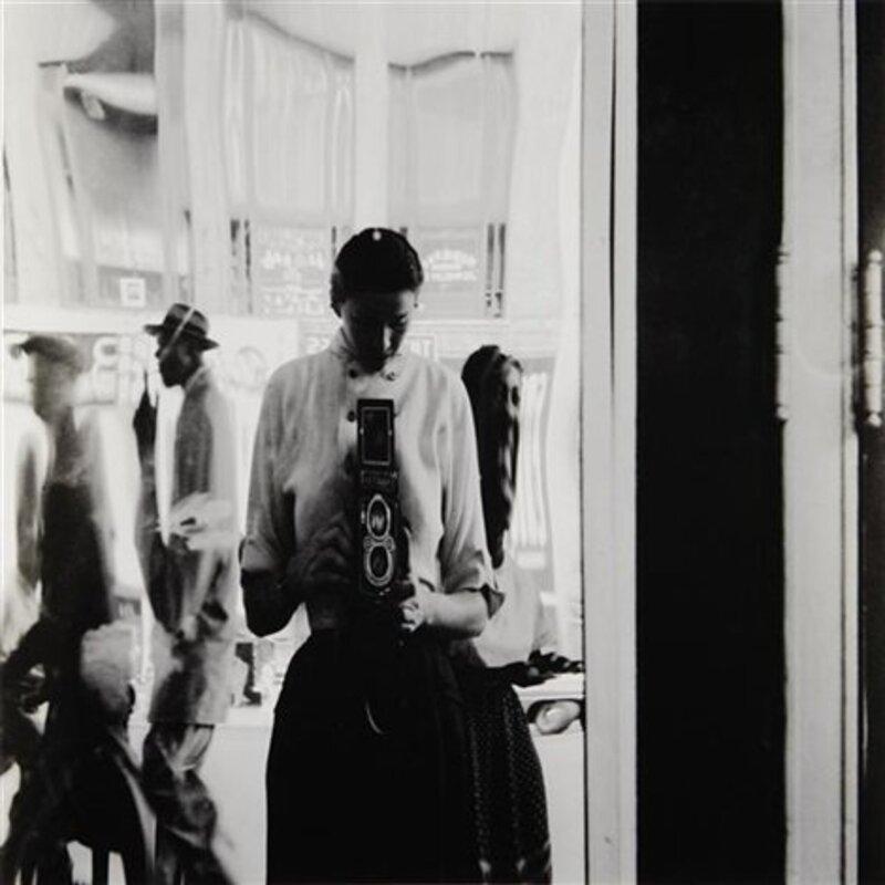 Eve Arnold Black and White Photograph - USA. New York City. 42nd Street Self-portrait. Eve ARNOLD in a distorting mirror
