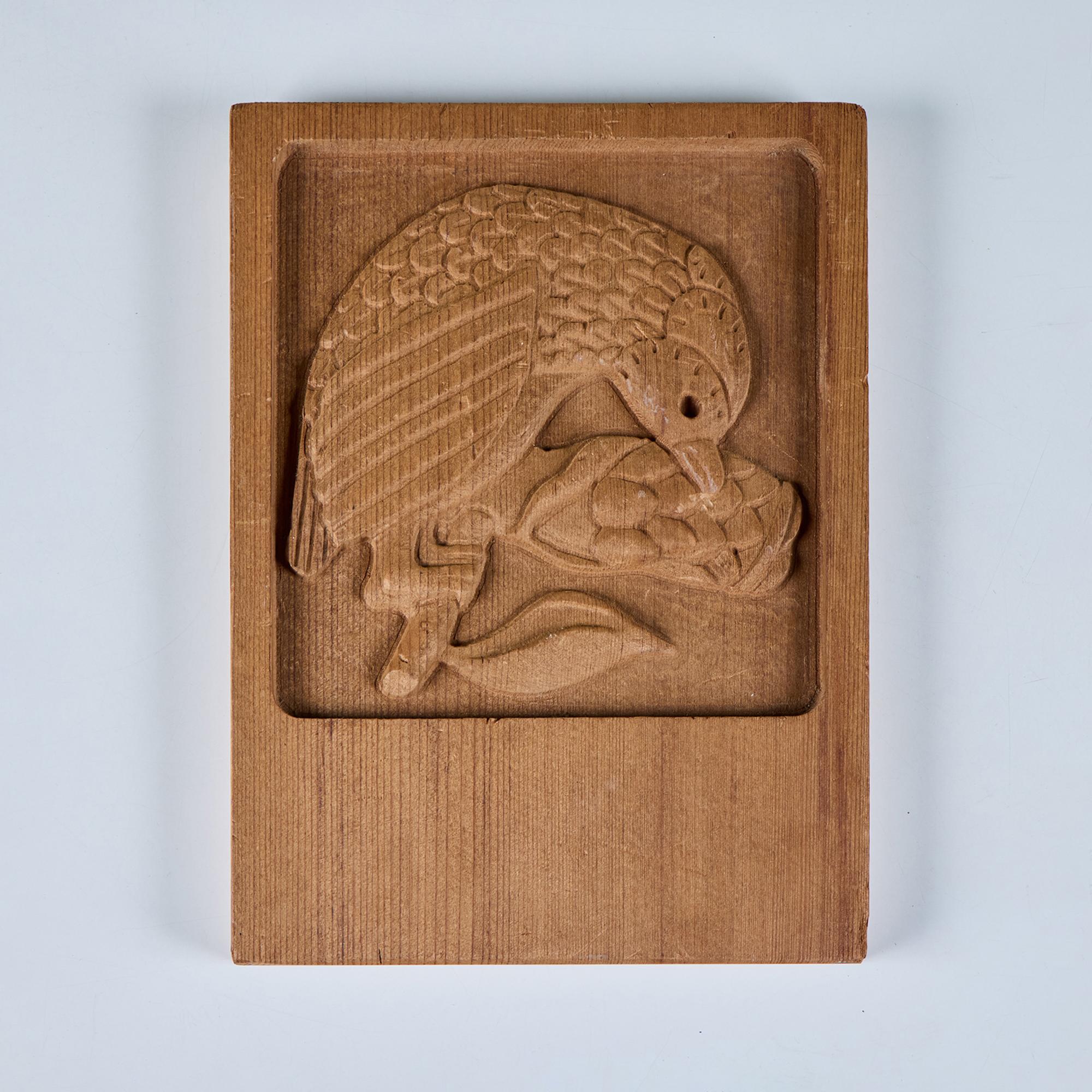 Wood carving by California artist, Evelyn Ackerman, c.1960s. This plaque features a hand carved bird.

Dimensions 
9.25