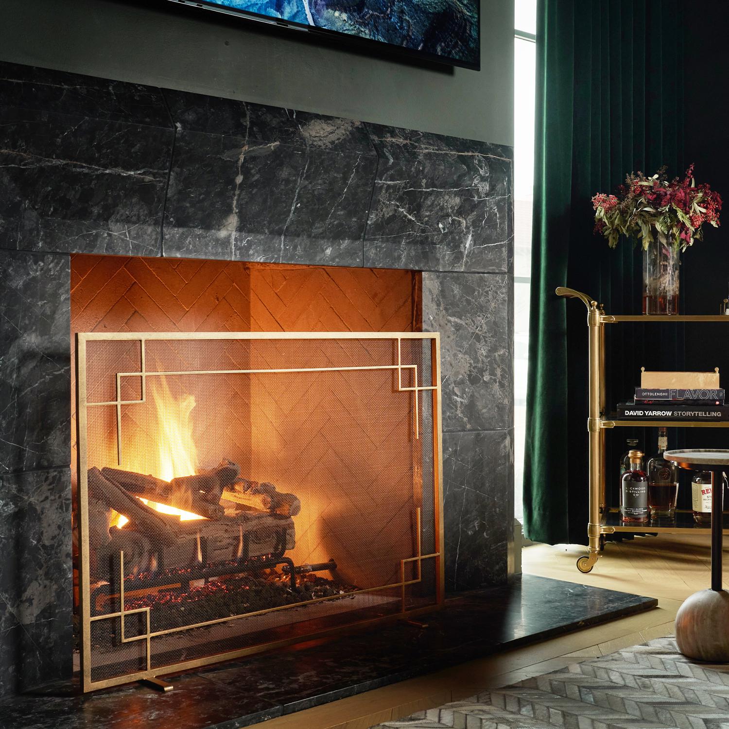 Minimalist and modern, Evelynne combines traditional metal artistry and contemporary elegance. This timeless design adds a layer of luxe to the fireplace of the modern home. Sculptural yet restrained, Evelynne was inspired by minimalist linear forms