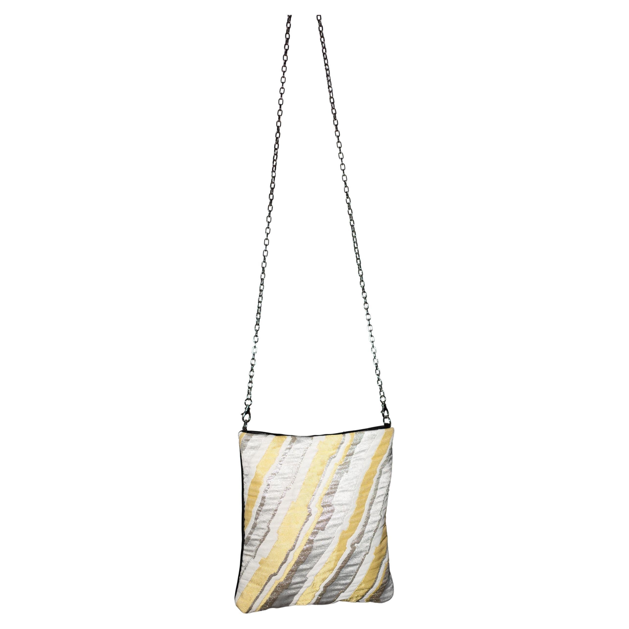 One of a kind Evening Shoulder Bags in Vintage Italian Silver Lurex White Pastel Yellow Brocade on one one side and on the other side Black Italian Napa Leather, Italian Palladium Plated Brass Shoulder Chain Detachable J Dauphin

Size: Height 21 cm,