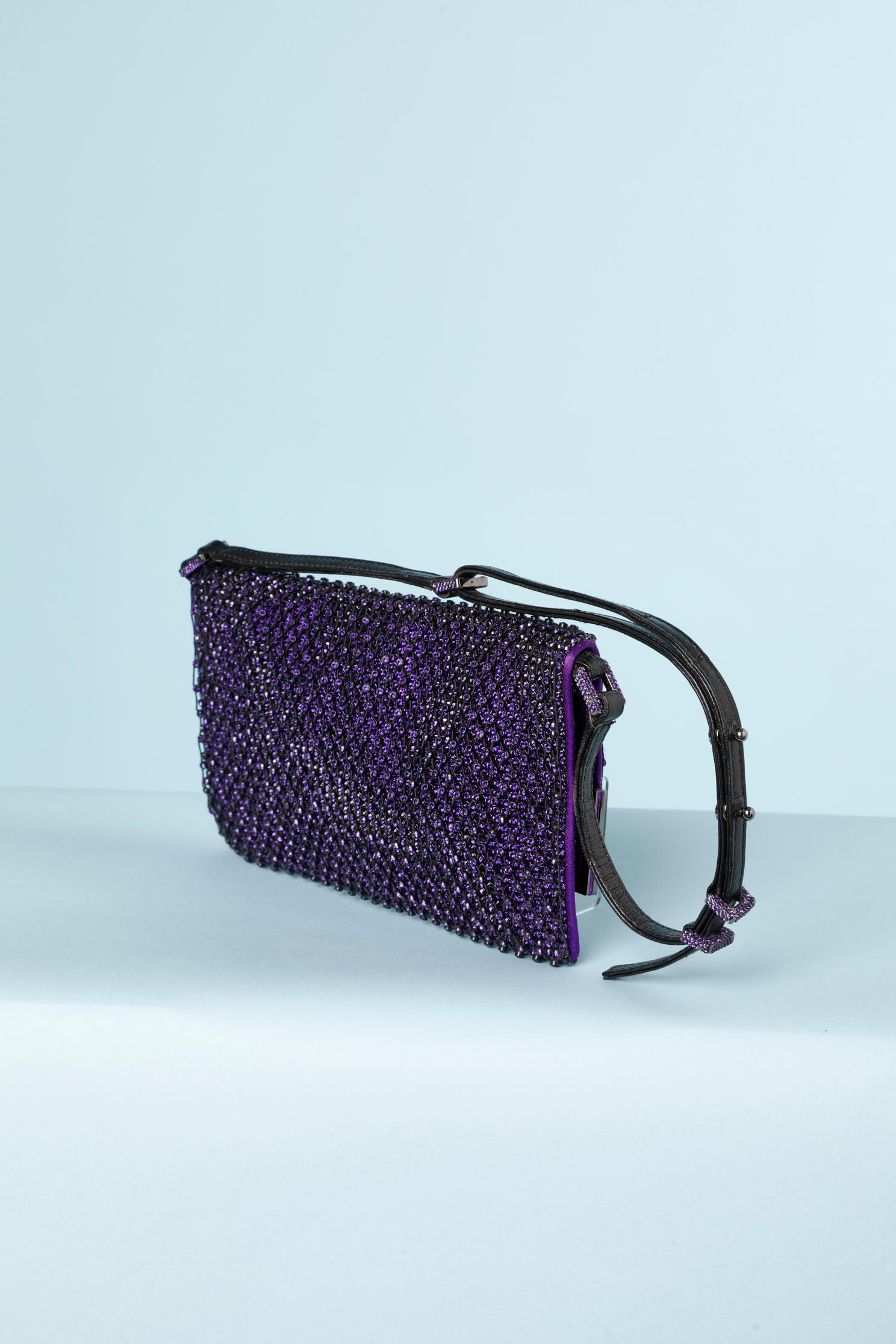 Evening clutch in purple rhinestone net and purple rhinestone and leather strap 
Size : 18cm X 12 cm X 1 cm