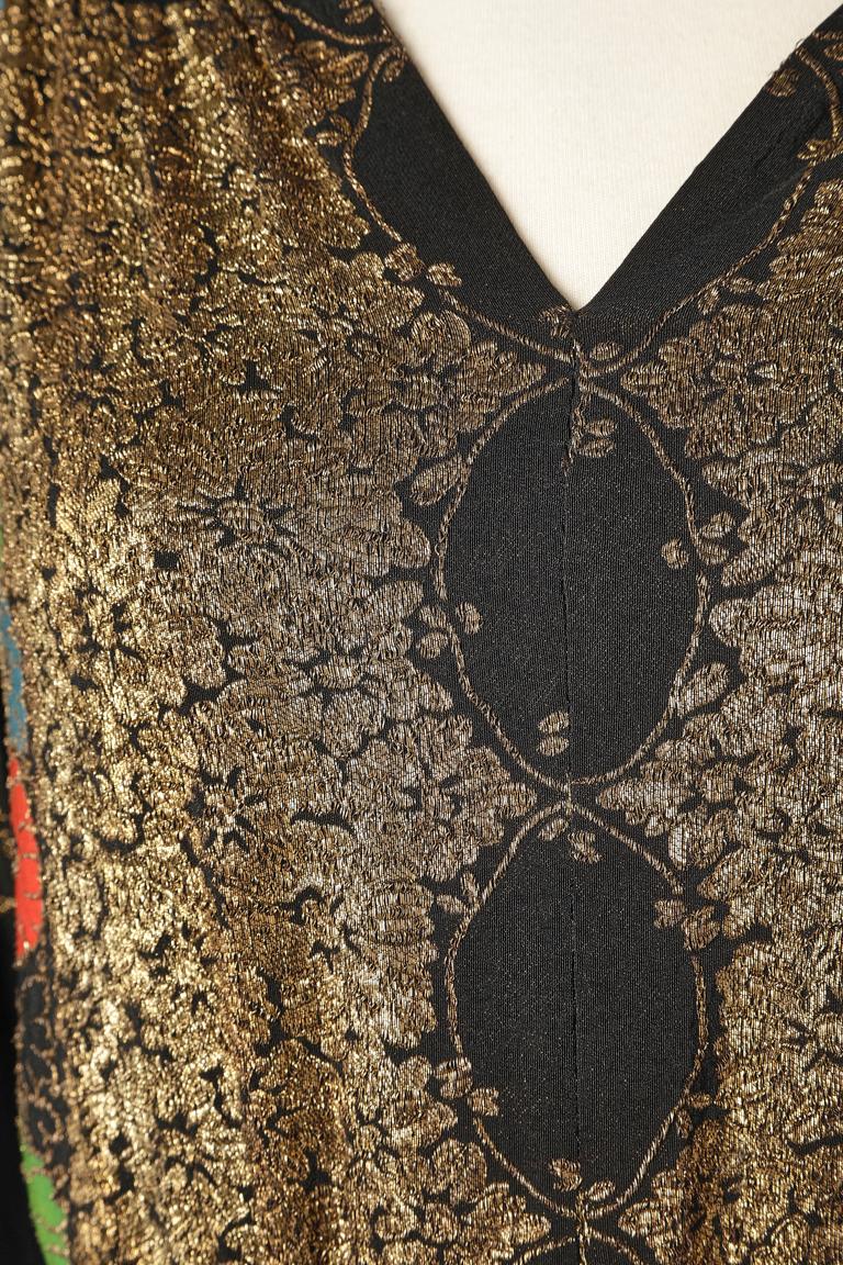  Evening dress in black crêpe satin and gold lurex flowers brocard top. Buttons in the middle back. 
SIZE XL