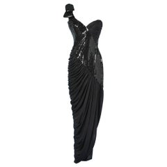 Evening dress in black sequins and silk by Loris Azzaro