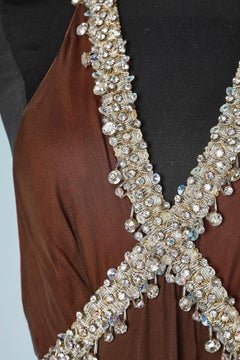 Evening dress in brown silk chiffon with rhinestone and lurex thread neckline
