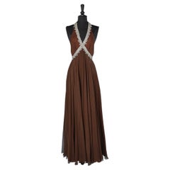 Evening dress in brown silk chiffon with rhinestone and lurex thread neckline