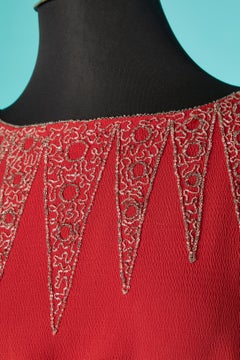 Evening dress in red crêpe with beadwork neckline and bow-belt  Circa 1930's
