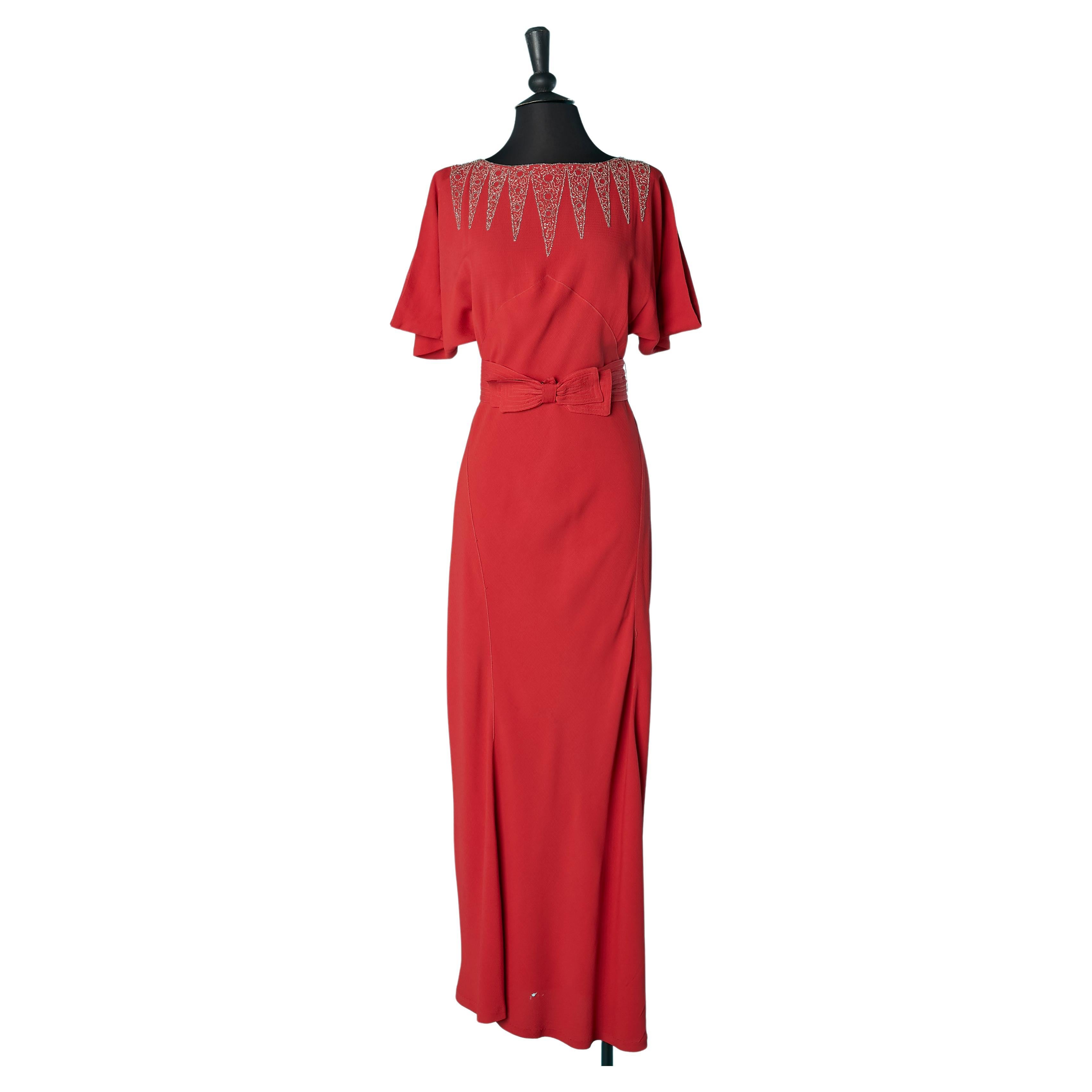 Evening dress in red crêpe with beadwork neckline and bow-belt  Circa 1930's  For Sale