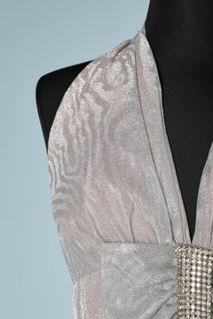 Evening dress in silver lurex moire with bow and rhinestone brooch Mike Benet