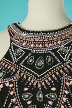 Vestido de noche con espalda abierta y pedrería Gai Mattiolo La Alfombra Roja