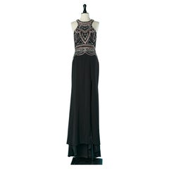 Vestido de noche con espalda abierta y pedrería Gai Mattiolo La Alfombra Roja
