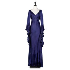 Evening dress with train in deep purple satin and long sleeves