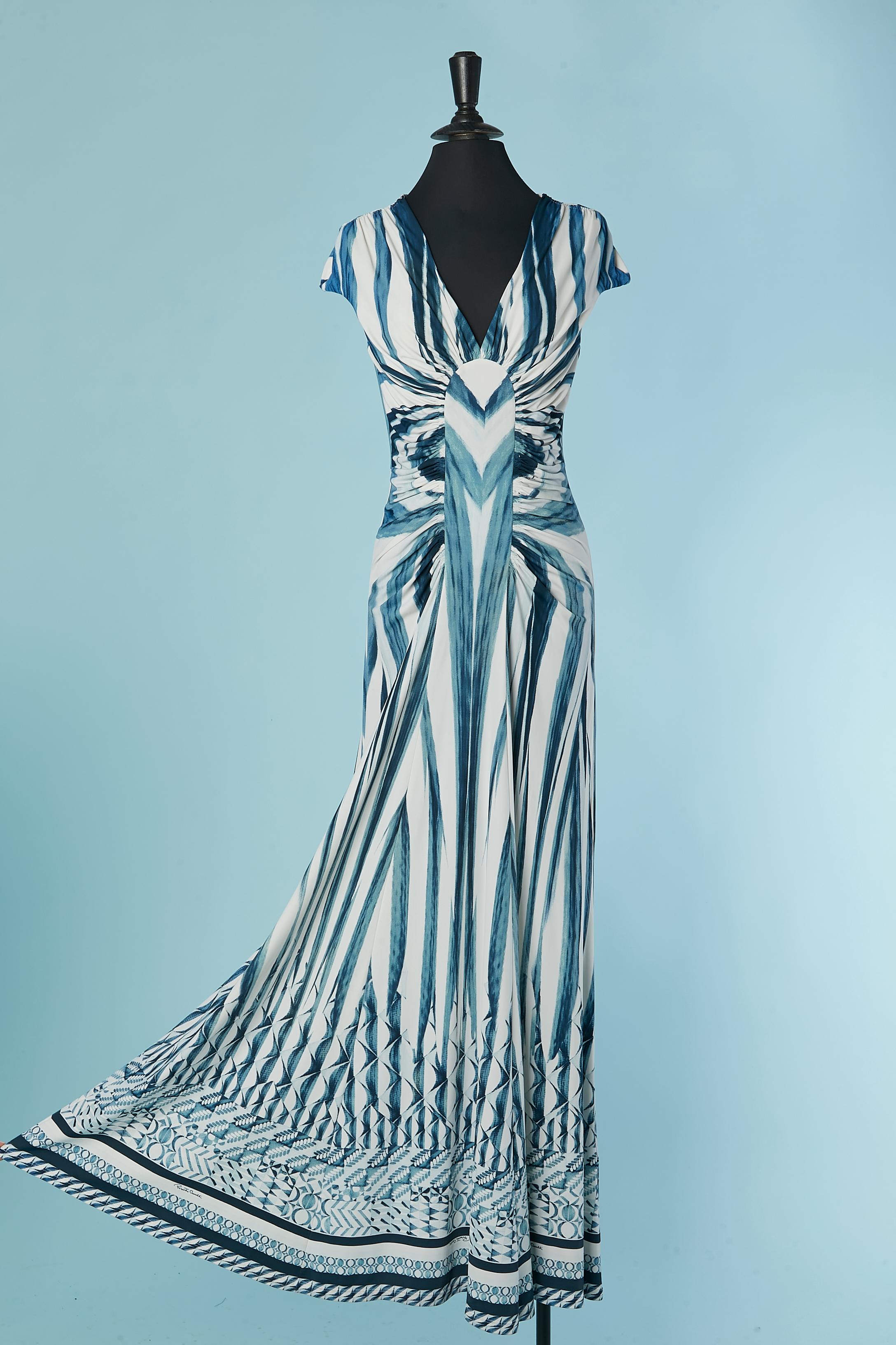 Evening printed dress with cut-work and gather on the front. Fabric composition: 88% nylon, 12% elastane. Lining in the same fabric inside the top part of the dress.
SIZE 42 (It) M 

