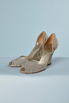 Evening pump in rhinestone, gold leather on tulle base Valentino Garavani