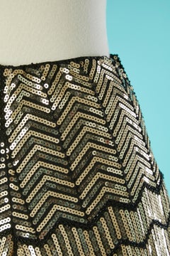 Evening short covered with gold sequins and black beads Saint Laurent