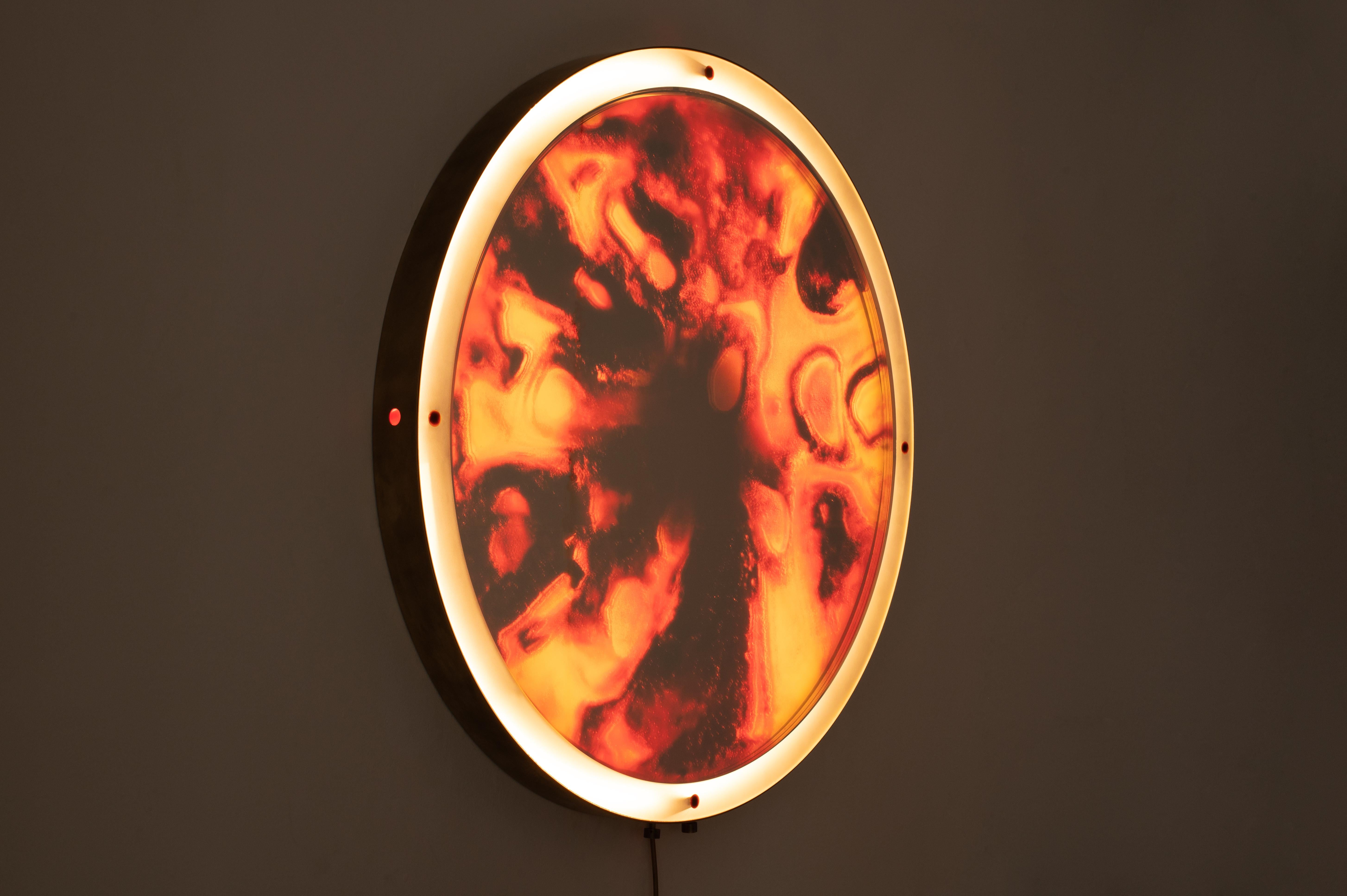 At first glance, the Event Horizon Mirror seems like an ordinary looking glass. Its left-hand knob illuminates an outer vanity ring, allowing one to view their reflection. Turning its right-hand knob, however, causes all reflectivity to vanish,