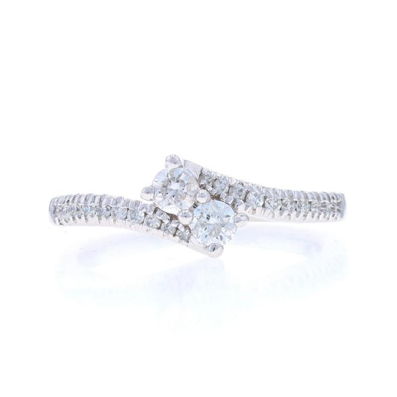 Retail Price: $1199

Size: 7 3/4
Sizing Fee: Up 2 sizes for $40 or Down 1 size for $40

Brand: Ever Us

Metal Content: 14k White Gold

Stone Information

Natural Diamonds
Carat(s): 1/2ctw
Cut: Round Brilliant
Color: H - I
Clarity: SI2 - I1

Total