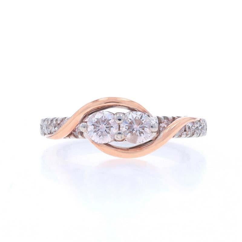 Retail Price: $2899

Size: 5 3/4
Sizing Fee: Up 1 1/2 sizes for $50 or Down 1/2 a size for $35

Brand: Ever Us

Metal Content: 14k White Gold & 14k Rose Gold

Stone Information

Natural Diamonds
Carat(s): 1.00ctw
Cut: Round Brilliant
Color: G -