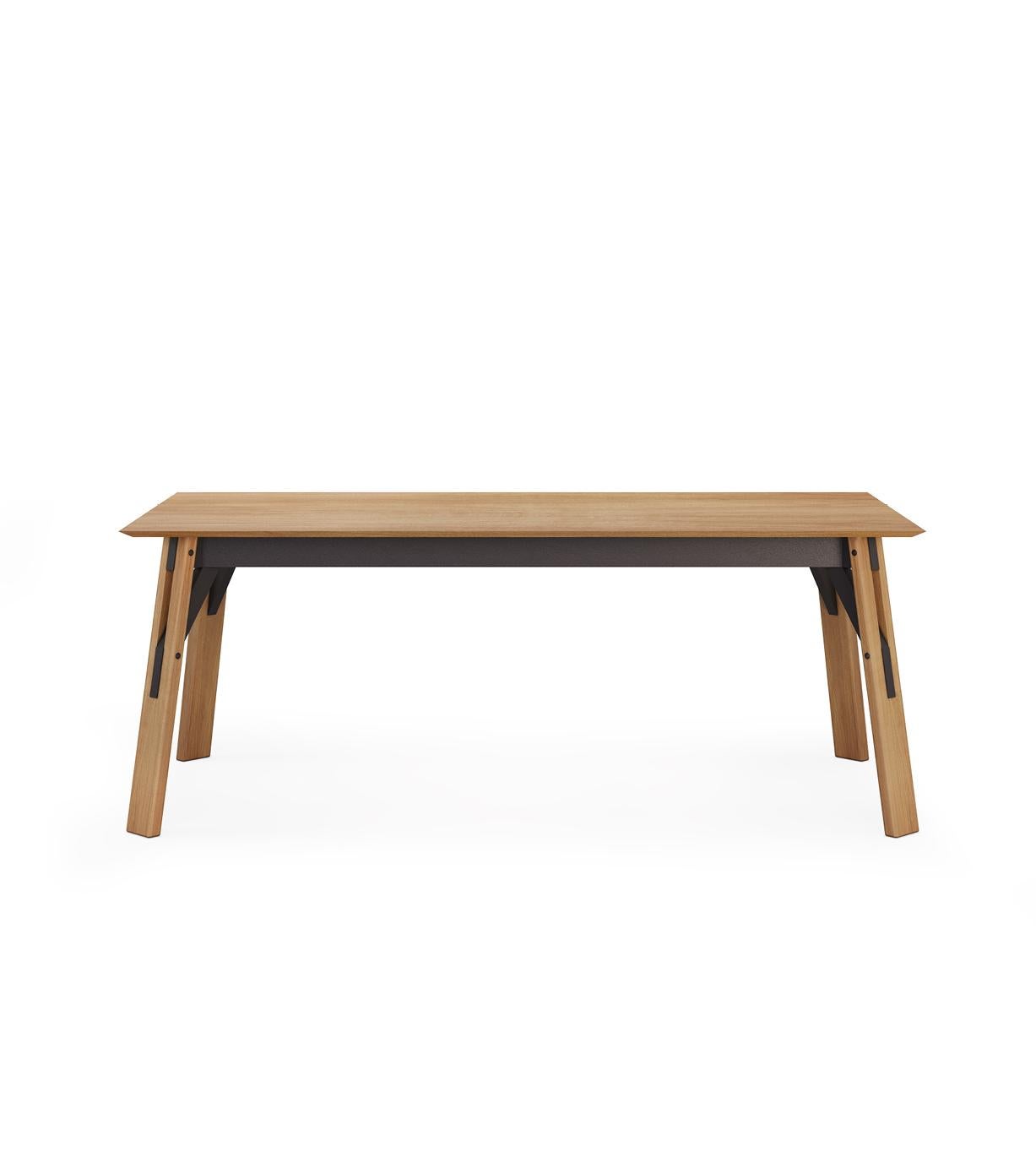 A classic design with modern details. The shape of the table expresses a complicated simplicity with geometric forms. With an extensible top, the table offers plenty of space for large gatherings. Sits comfortably 6 (+4) people.