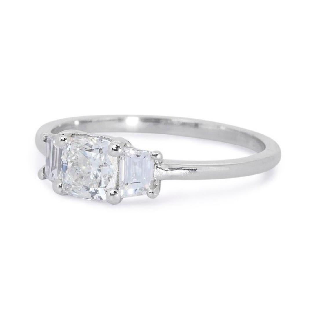 
Introducing our exquisite 18K White Gold Ideal Cut 3 Stone Diamond Ring, a timeless piece designed to captivate with its elegance and brilliance. Crafted with precision and passion, this ring features a stunning 1.00 Carat Diamond as its main