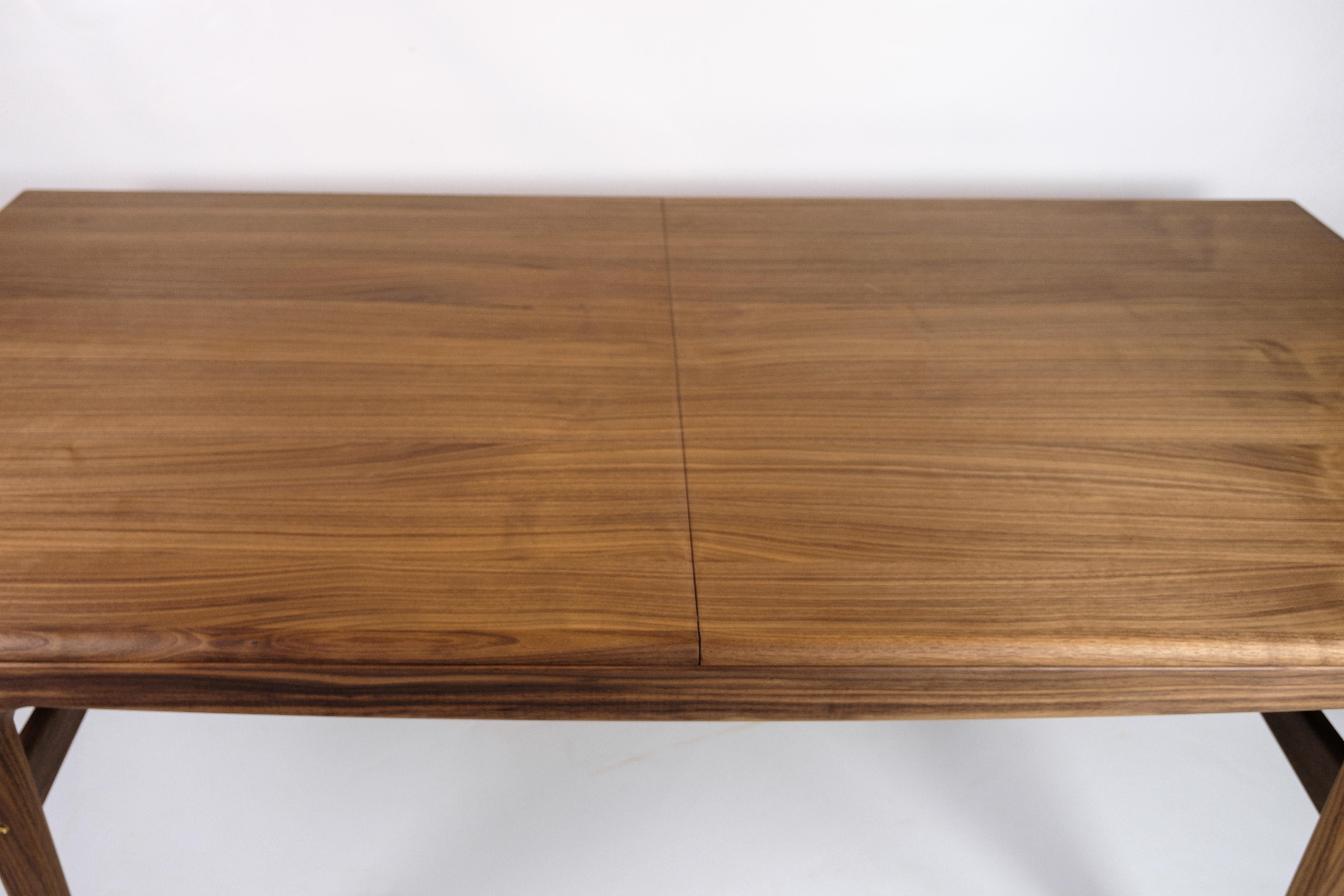 Danish Evermore Dining Table Made In Walnut By Arne Hovmand-Olsen For Warm Nordic For Sale