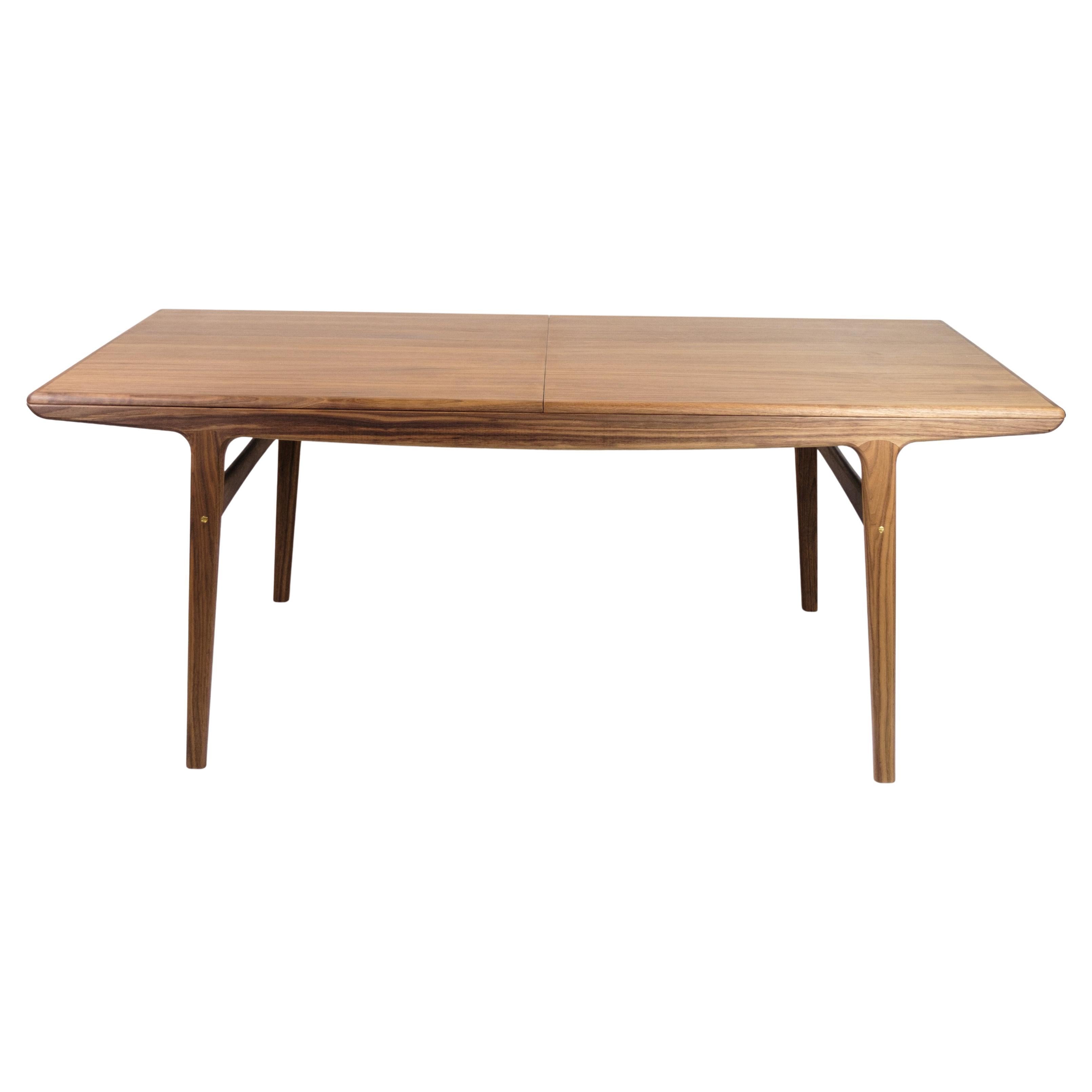 Evermore Dining Table Made In Walnut By Arne Hovmand-Olsen For Warm Nordic