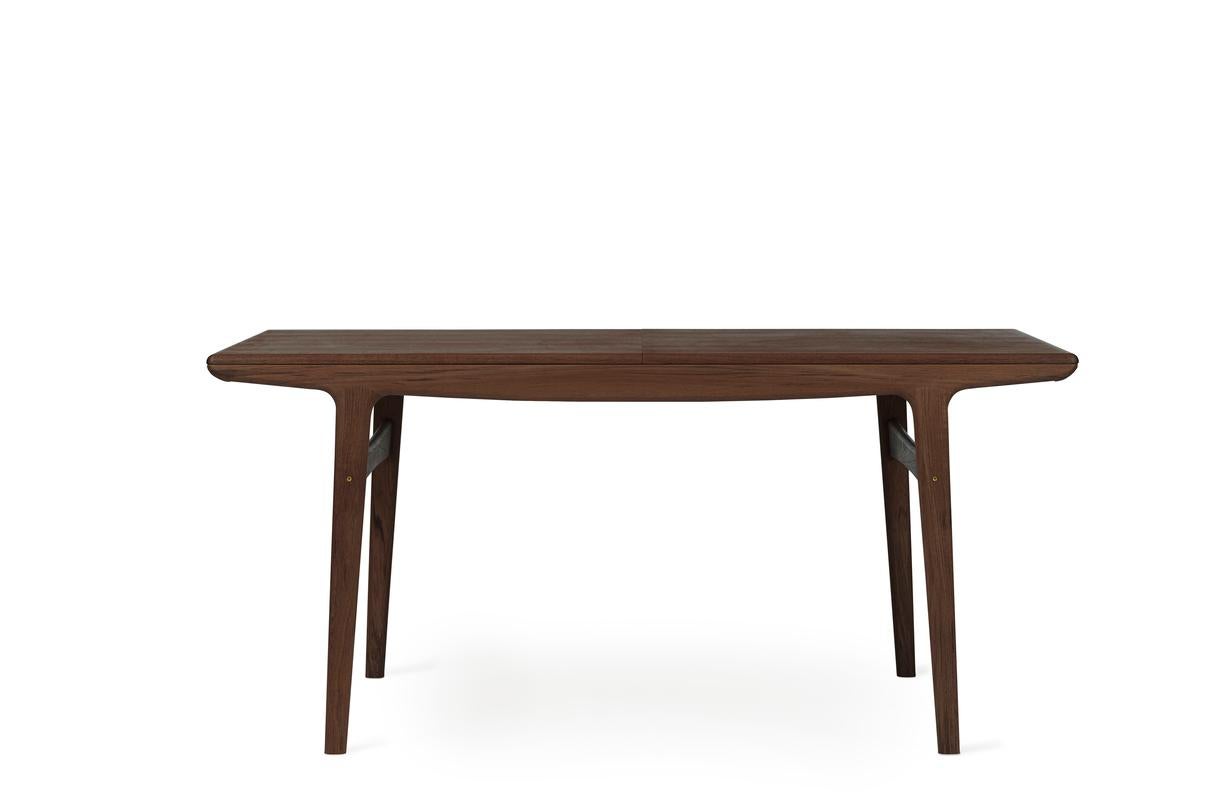 Evermore dining table walnut 160 by Warm Nordic
Dimensions: D160 x W85 x H74 cm
Material: Oiled solid walnut and veneer.
Weight: 41 kg
Also available in different colors and dimensions. 

A simple, timeless designer table created in the 1950s