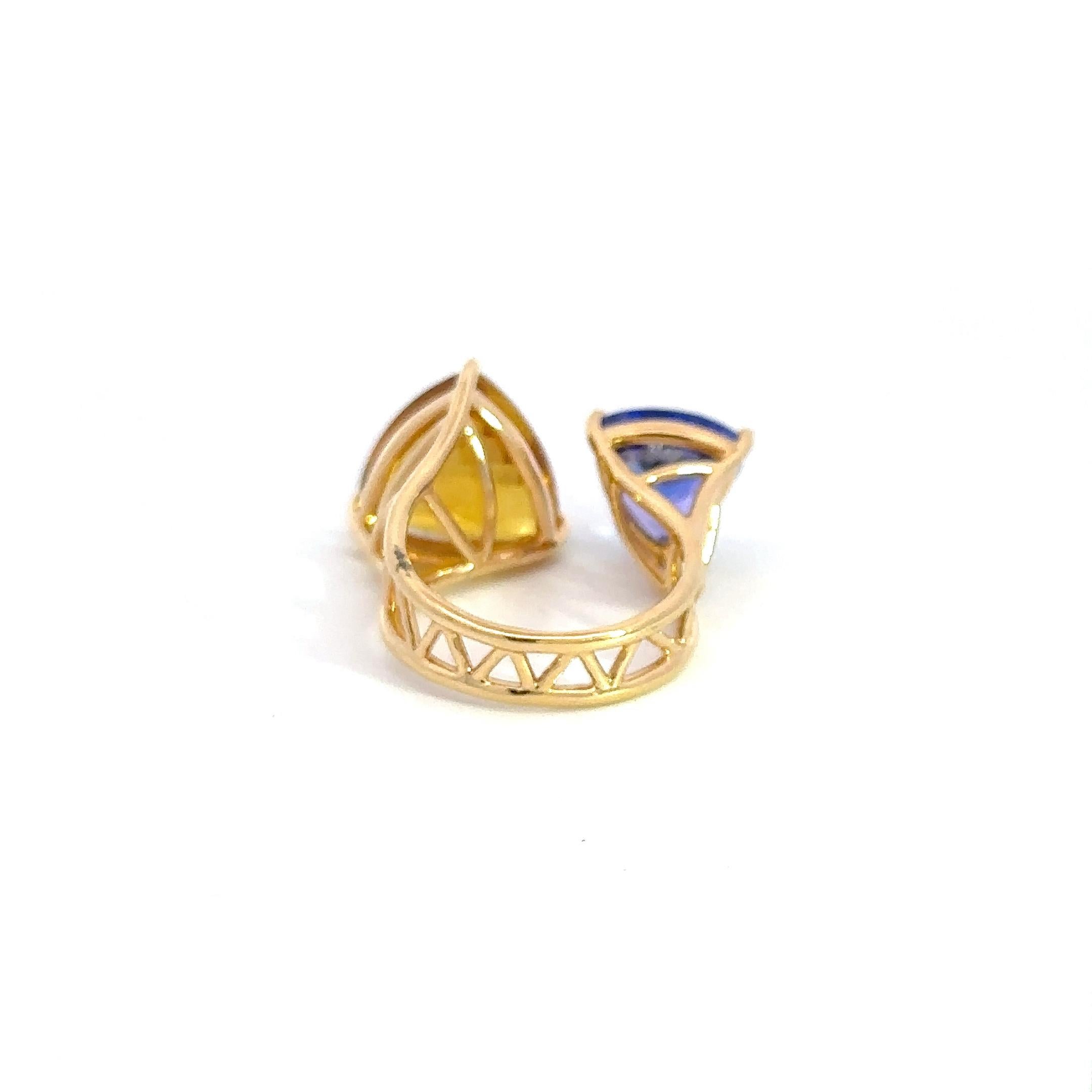 Ring

18K Yellow Gold 

Weight 6,05 grams

Beryl-1/7.63 Cts
Tanzanite -1/3.62 Cts

Size-55

Uncover the elegance of structural beauty with this striking ring, masterfully crafted from6.05 grams of 18k yellow gold. At the heart of this design lies a
