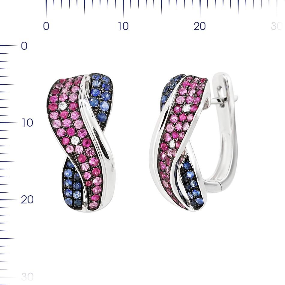 Earrings White Gold 14 K
Diamond 4-Round 57-0,03-4/5A
Blue Sapphire 36-Round-0,33 Т(5)/3C
Pink Sapphire  26-Round-0,24 1/2C
Pink Sapphire 50-Round-0,46 3/2C
Weight 6.4 grams

With a heritage of ancient fine Swiss jewelry traditions, NATKINA is a